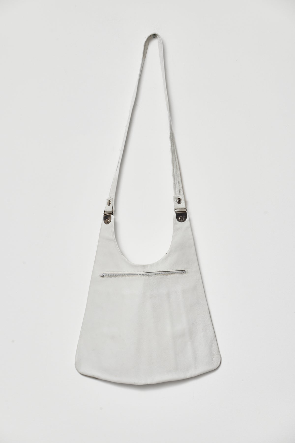 THE WHITE SADDLE BAG
