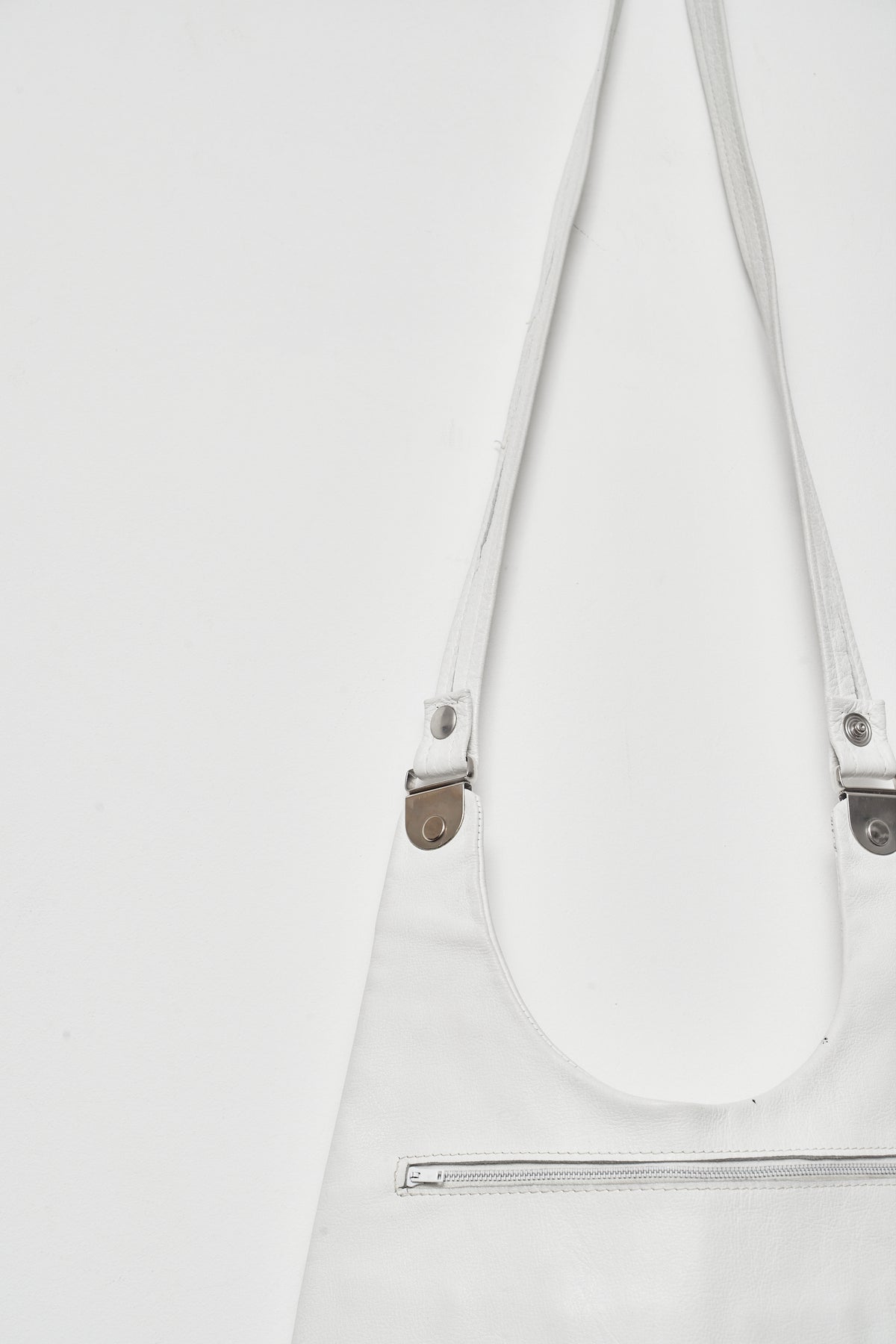 THE WHITE SADDLE BAG